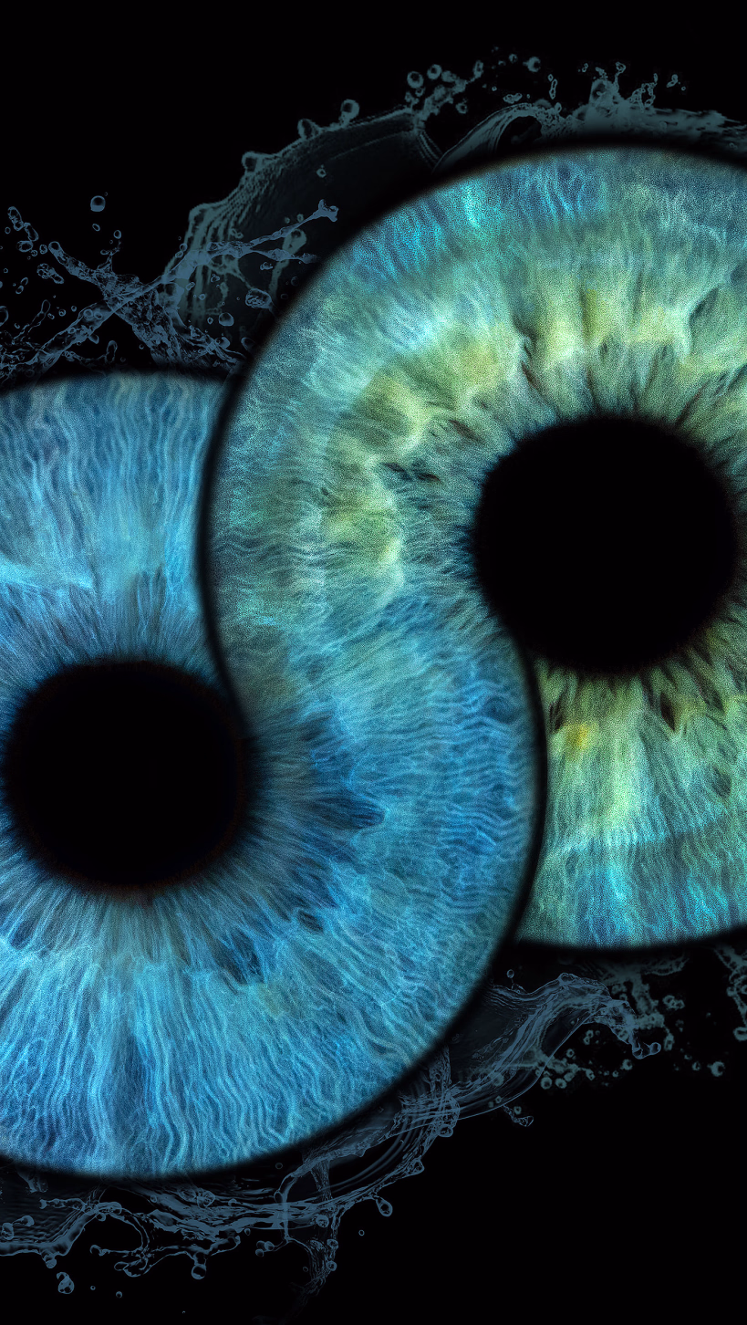 To detaljerte, overlappende iriser i blått og grønt som danner en yin-yang-form på svart bakgrunn, omgitt av dynamisk vannsprut.